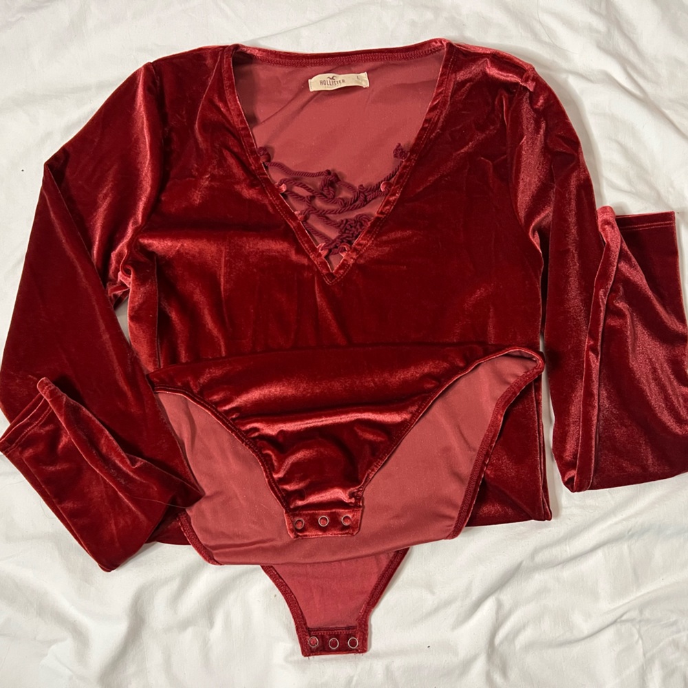Red Hollister velvet body suit with lace up detail